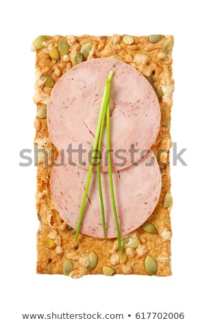 Stock photo: Pumpkin Seed Cracker With Soft Sausage Slices