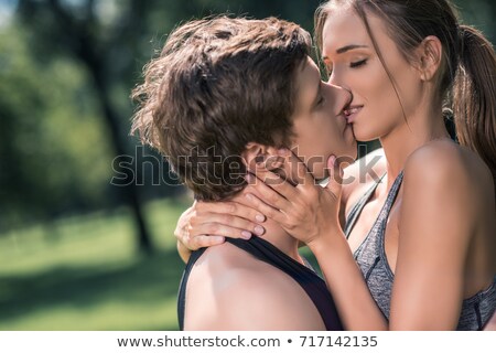 Stock photo: Sportive Couple Kissing Each Other