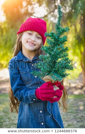 Stock fotó: Cute Mixed Race Young Girl Wearing Red Knit Cap And Mittens Outd