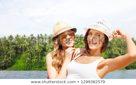 Stock fotó: Teenage Girls Over Infinity Edge Pool In Sri Lanka