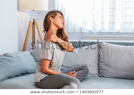 Neck Pain And Shoulder Pain In A Woman Zdjęcia stock © Photoroyalty