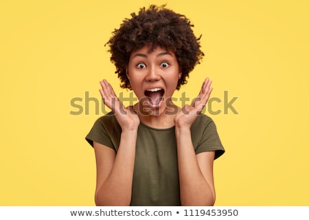 Foto d'archivio: Happy Surprised Young African American Woman