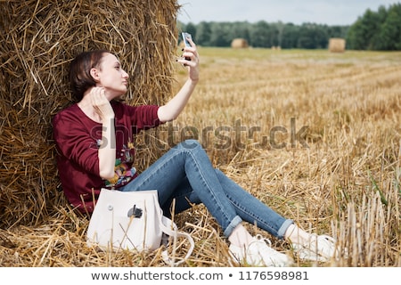 Stock photo: Young Beautiful Playful Women Near Hay Stacks