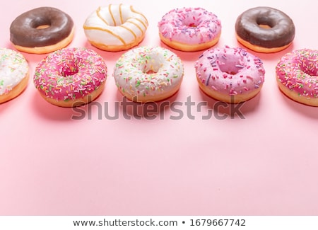 Stok fotoğraf: Row Of Sweet Round Doughnuts