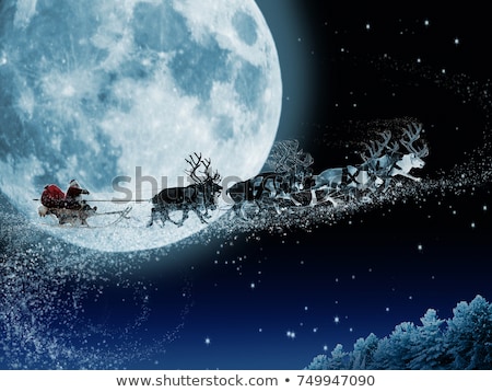 商業照片: Santa Claus On A Sleigh With Reindeer In The Winter Forest