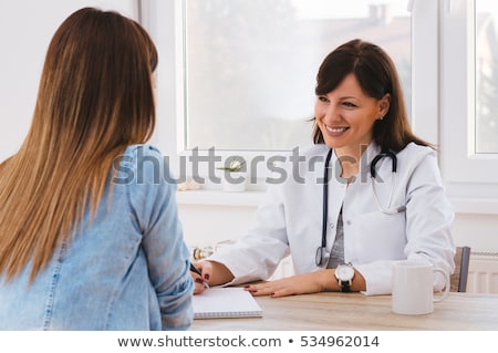 商業照片: Having Consultation At Doctors Office