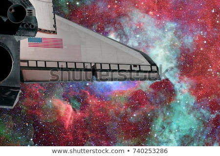 Foto stock: Space Shuttle Flight Over Space Stars Galaxies And Nebula
