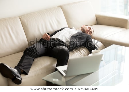 Stock photo: The Employee With Too Much Work Taking It Home