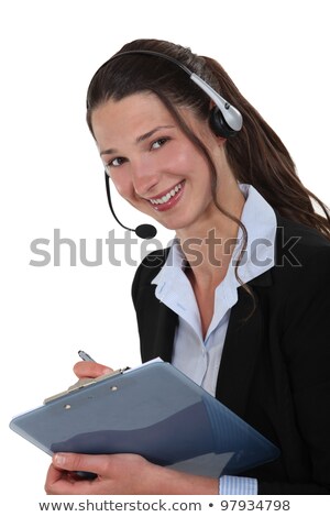 Foto stock: Cheerful Call Center Supervisor With Clip Board