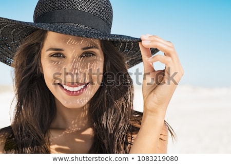 Foto stock: Beautiful Young Woman At The Beach