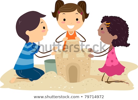 Stock photo: Boys Plays At The Beach With Sand And Building Figures