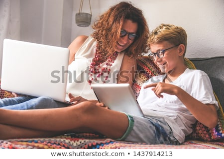ストックフォト: Male Kid Learning With His Device