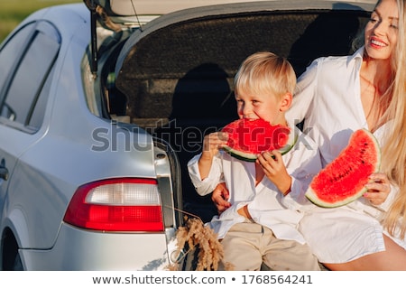 Foto d'archivio: Boy Eating Watermelon