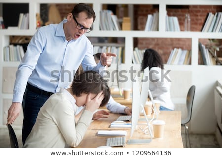 商業照片: Businessman Shouting At Female Employee