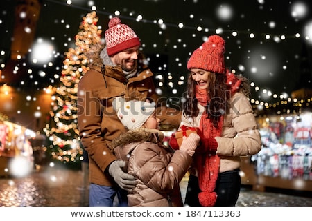 Foto stock: Mother And Father With Kids Outdoors Town Street