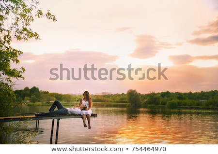 Foto stock: Beautiful Girl In Jeans Sarafan Dancing