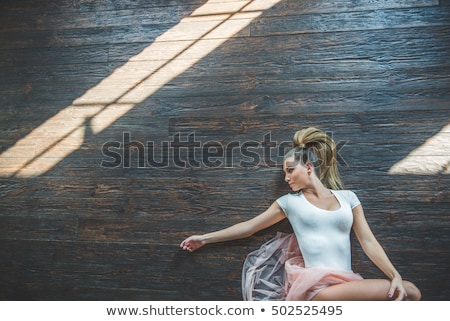 Stock photo: Dancer On The Floor Looking Away