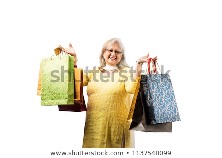 Stockfoto: Fashionable Old Lady With Shopping Bag