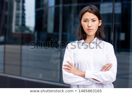 Stock fotó: Young Asian Woman Standing With Her Arms Crossed