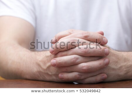 ストックフォト: Casual Man Holding His Hands Together