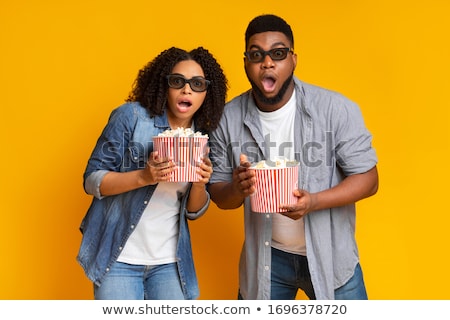 Foto d'archivio: Couple Wearing 3d Glasses With Shocked Faces