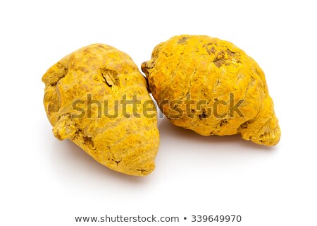 [[stock_photo]]: Pile Of Organic Round Turmeric Curcuma Longa