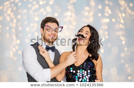 Foto stock: Young Woman Having Fun In A Photo Booth