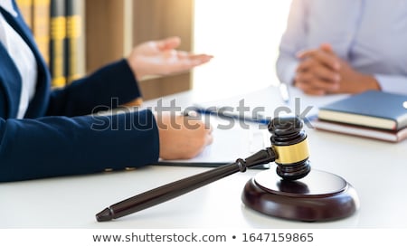 Stock fotó: Female Lawyer Explaining Legal Situation And Discussing With Con