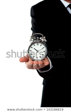 Foto stock: Cropped Image Of A Man With Alarm Clock On His Palm