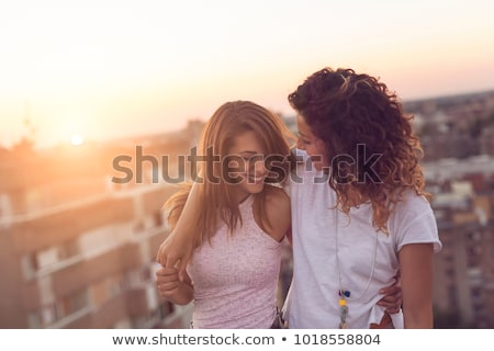 Foto stock: Gay Couple At Sunset