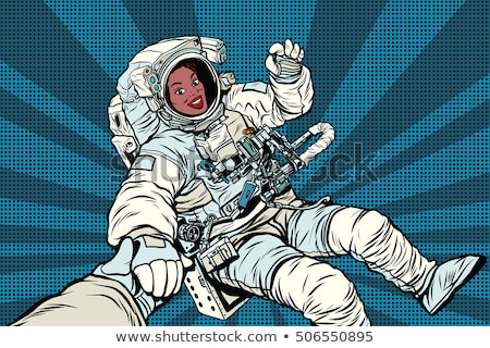 Stock photo: A Couple In Love Astronauts Holding Hands