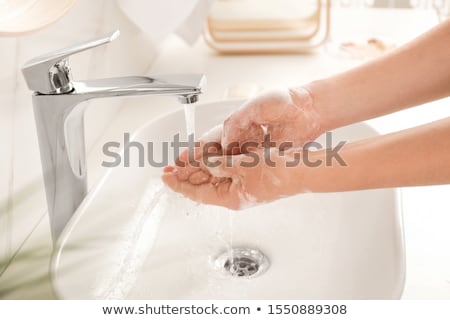 Stock fotó: Young Woman In The Bathroom Of A Contemporary Apartment