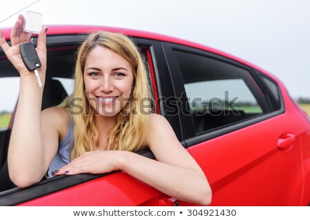 Stockfoto: Blond Teenage Girl Holding Driving License