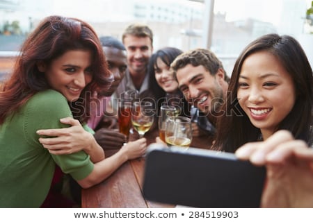 Stockfoto: Women Taking Selfie By Smartphone At Wine Bar