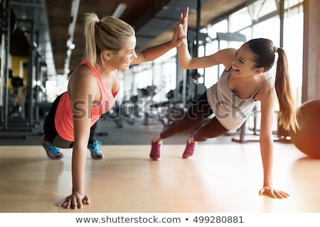 Foto stock: Ulher · na · academia