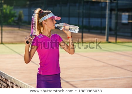 ストックフォト: Tennis Player Drinking Water