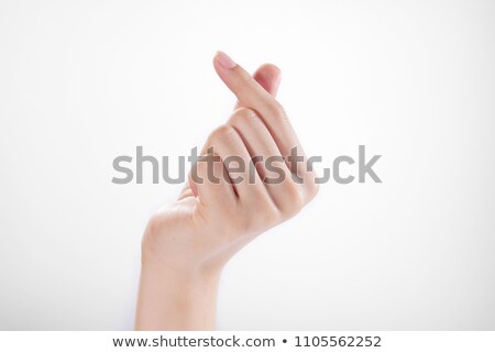 Foto stock: Young Woman From Back Showing The Finger