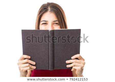 Сток-фото: Woman Reading A Book Making Eye Contact