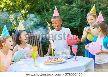 Foto d'archivio: Happy Kids On Birthday Party At Summer Garden