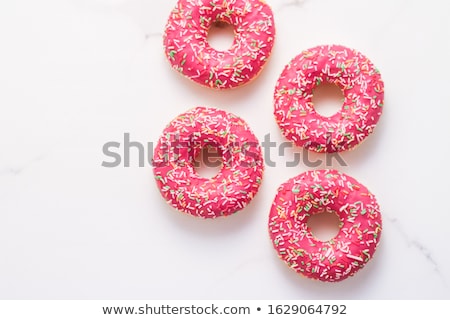 Stock fotó: Frosted Sprinkled Donuts Sweet Pastry Dessert On Marble Table B