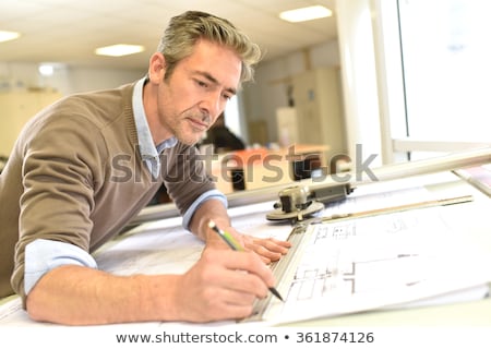 Stockfoto: Mature Architect With Blueprints