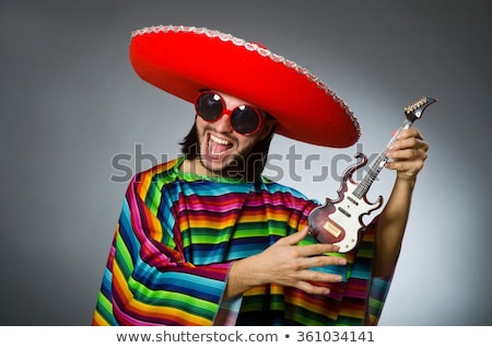 Сток-фото: Man Wearing Sombrero With Guitar