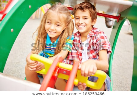 Stok fotoğraf: Handsome Boy And Girl On Playground