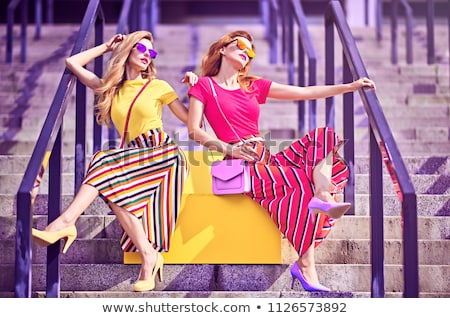 Stok fotoğraf: Twins Female Models Posing Outdoor