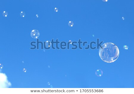 [[stock_photo]]: Blowing Bubbles Into The Sky