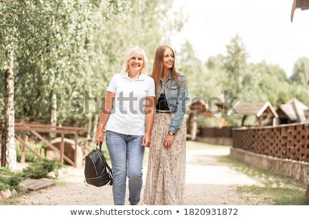 Mother And Daughter Walking Together Summer Cloth Stok fotoğraf © Alones