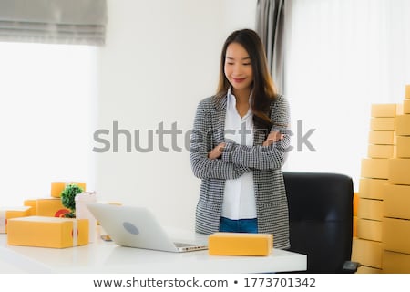 Foto stock: Portrait Of A Beautiful Young Businesswoman On The Phone And Hap