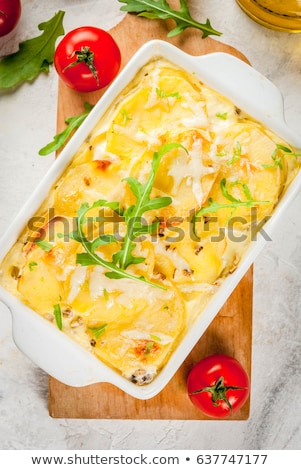 Stockfoto: Potatoes With Arugula And Onion