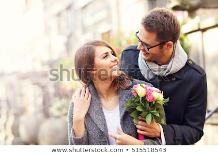 Stockfoto: Beautiful Couple With Flowers Dating