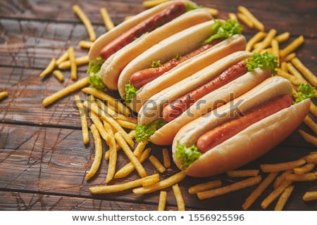Stock photo: American Hot Dogs Assorted In Row Served With French Fries